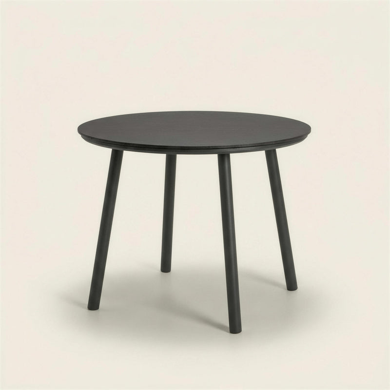 Mesa de comedor de exterior Mundra, redonda de 100 cm con tablero HPL y cuatro patas cilindricas de aluminio antracita, 76 cm de alto, sobre fondo neutro