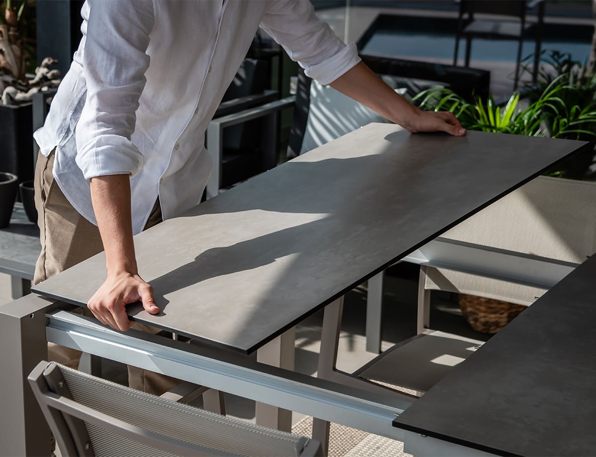 Mesa extensible exterior aluminio · HPL · Java · detalle